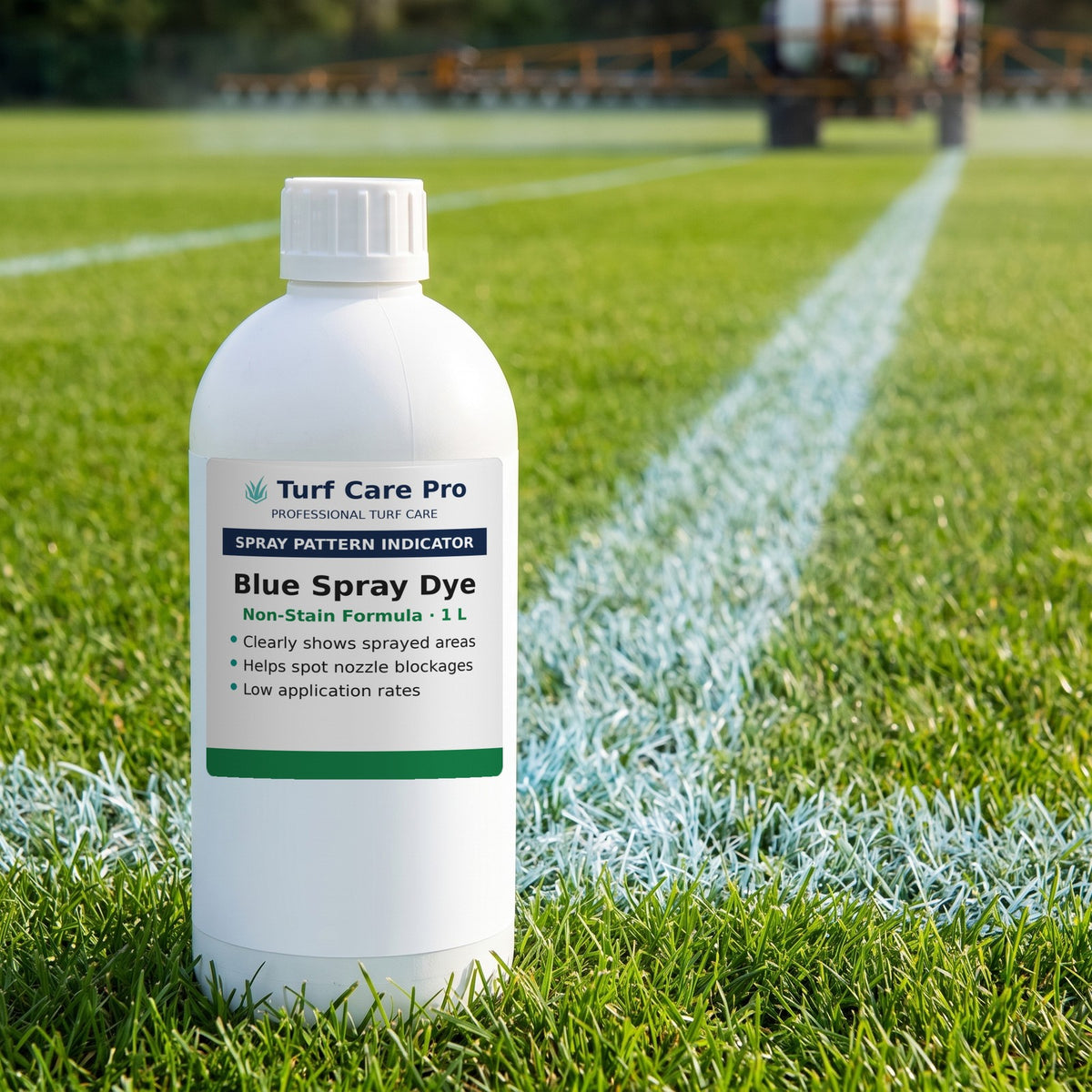 1L blue spray pattern indicator dye on a pitch showing a blue-tinted sprayed pass