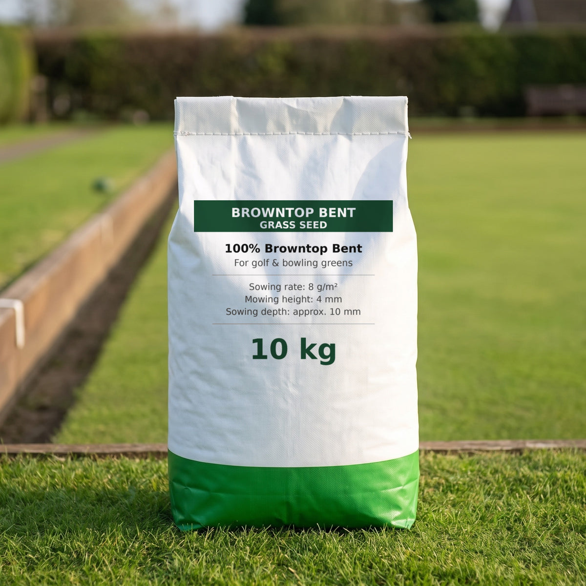 Browntop Bent Grass Seed 10kg – 100% Bent Mix bag beside a bowling green