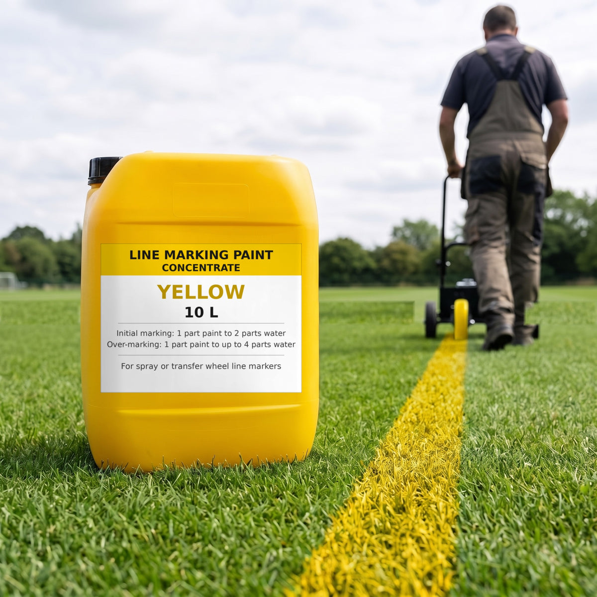 Yellow line marking paint concentrate 10L with a yellow line being marked by a transfer wheel line marker