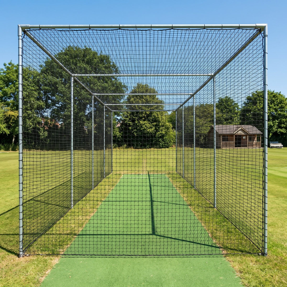 2.7m black cricket netting on a practice net bay over an artificial pitch