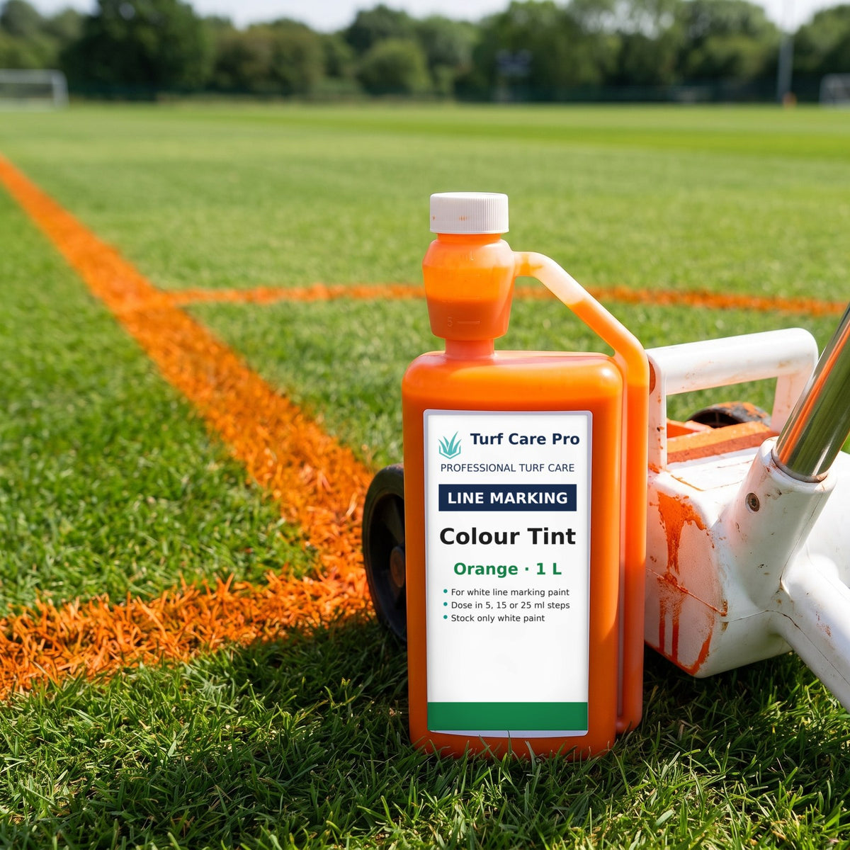 Orange colour tint for white line marking paint, 1L bottle beside orange pitch lines