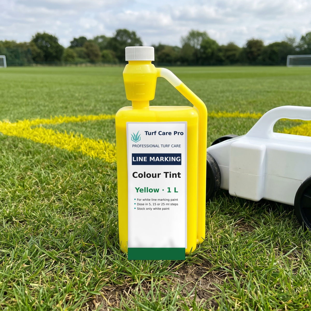 Yellow colour tint for white line marking paint, 1L bottle beside yellow pitch lines
