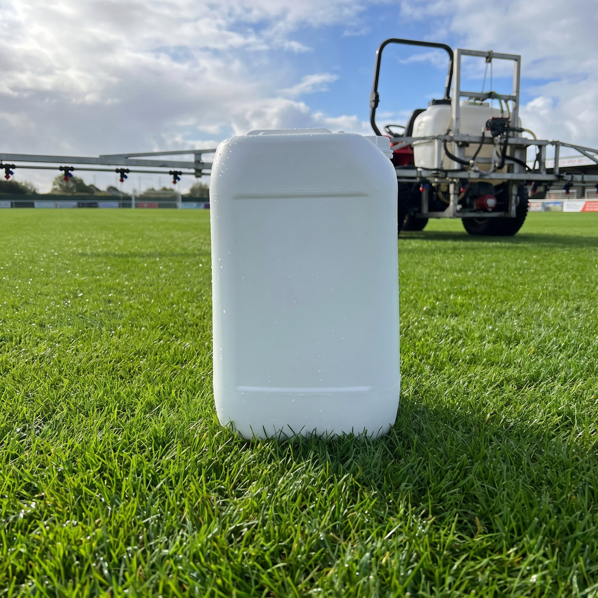10L penetrant wetting agent on a sports pitch with a spray boom ready for application