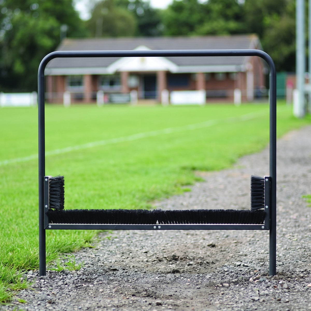 2.6m permanent boot wiper set into the ground at a rugby pitch entrance path