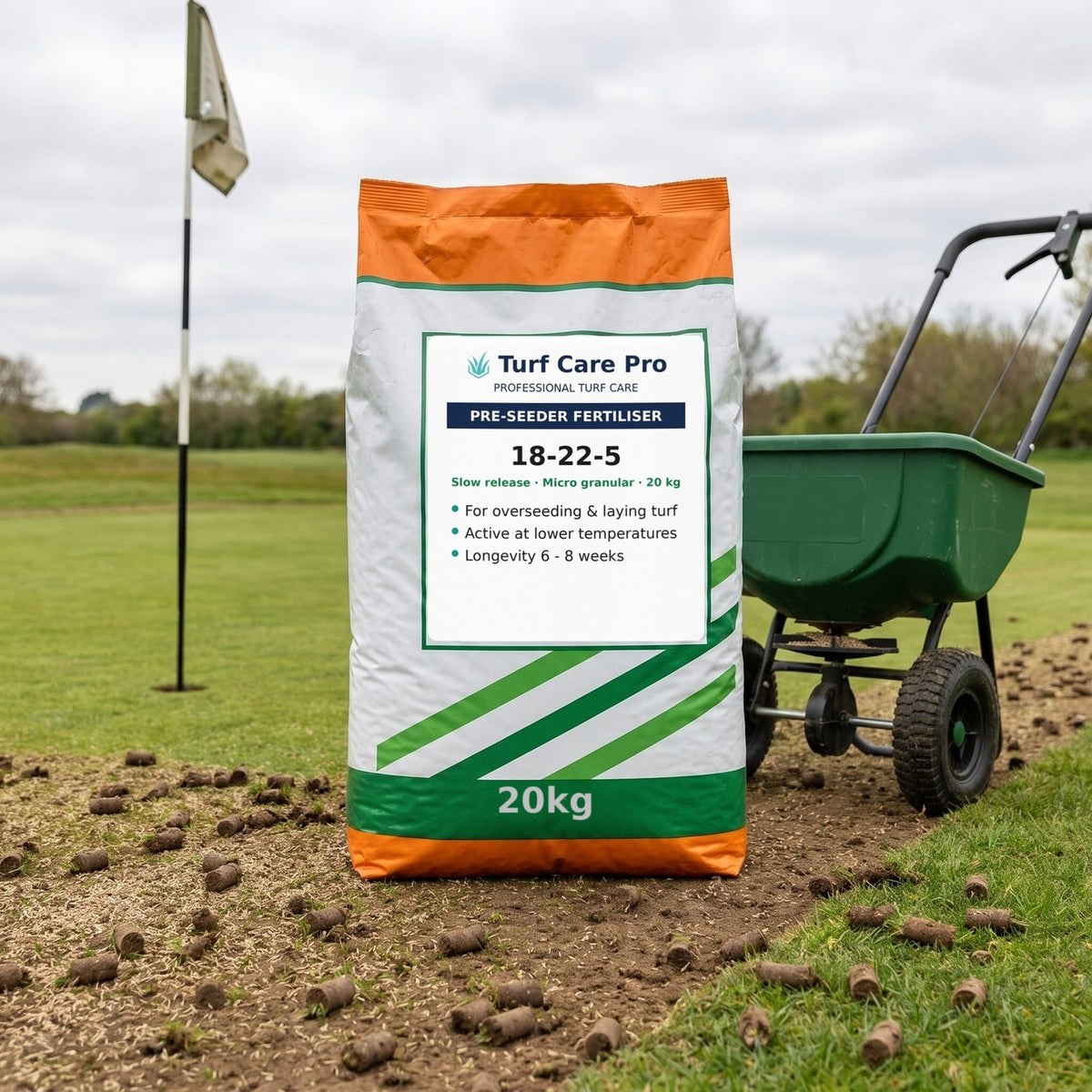 20kg pre-seeder fertiliser bag beside a spreader on a hollow-tined green ready for overseeding